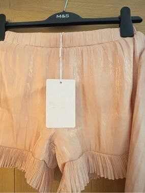 Shimmery Peach Pleated Hem Shorts